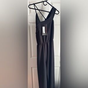 Rebdolls “Find Your Love” Black Asymmetrical Jumpsuit